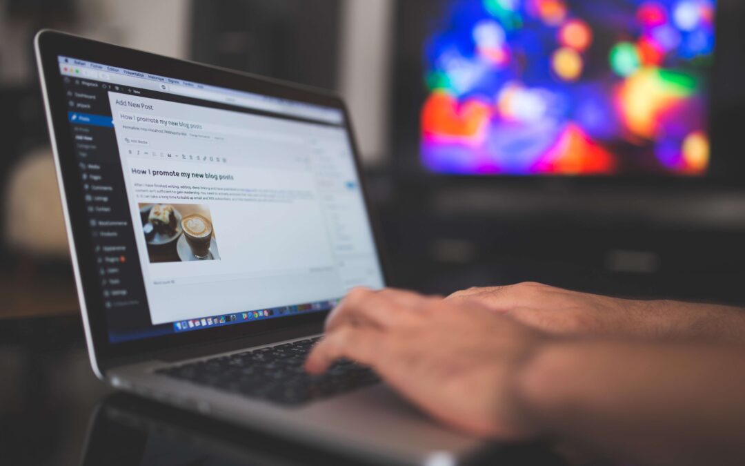 writing a blog on a laptop